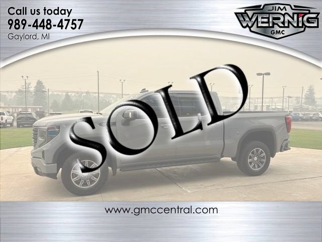 2024 GMC Sierra 1500 AT4 in Thunderstorm Gray — front three-quarter view